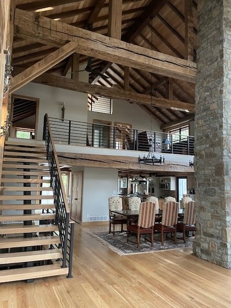 SIP Timberframe Lake cabin Staircase and dining room SIP Timberframe Lake cabin Staircase and dining room